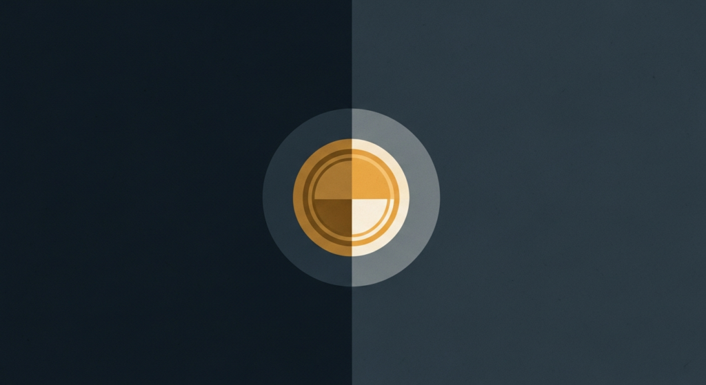 Illustration: a gold coin half in shadow, half in light